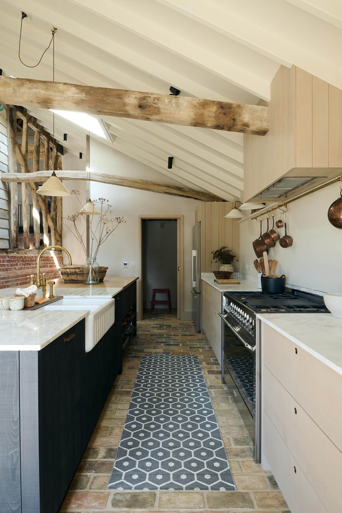 devol-The-Sebastian-Cox-Kitchen-wooden-beams-stone-floor-runner-nordroom