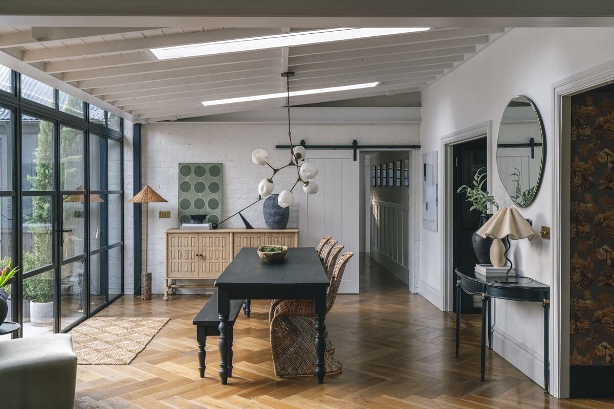 A Victorian Home with a Modern Black Extension 11 dining-room-crittall-windows-bench-wooden-floor-nordroom