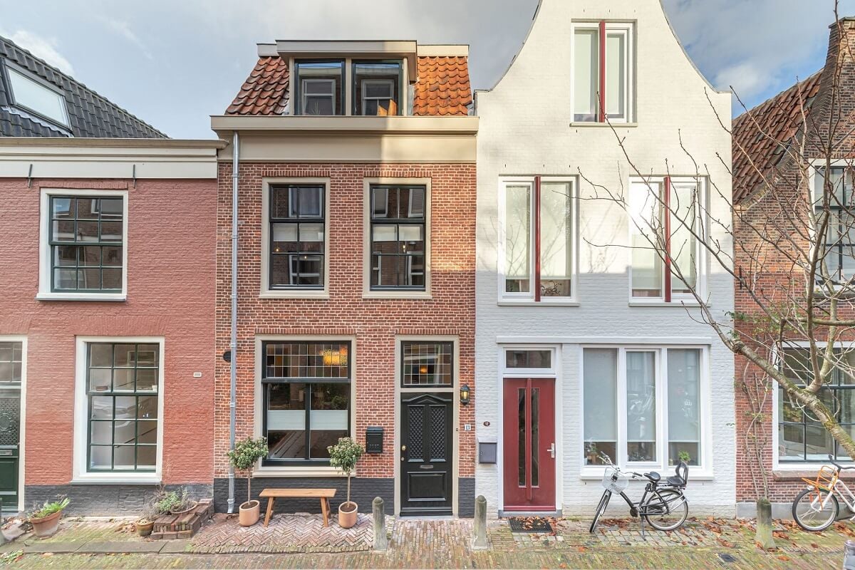 Gray and Earth Tones in a Restored Weavers House in The Netherlands 28 exterior-historic-townhouse-netherlands-nordroom