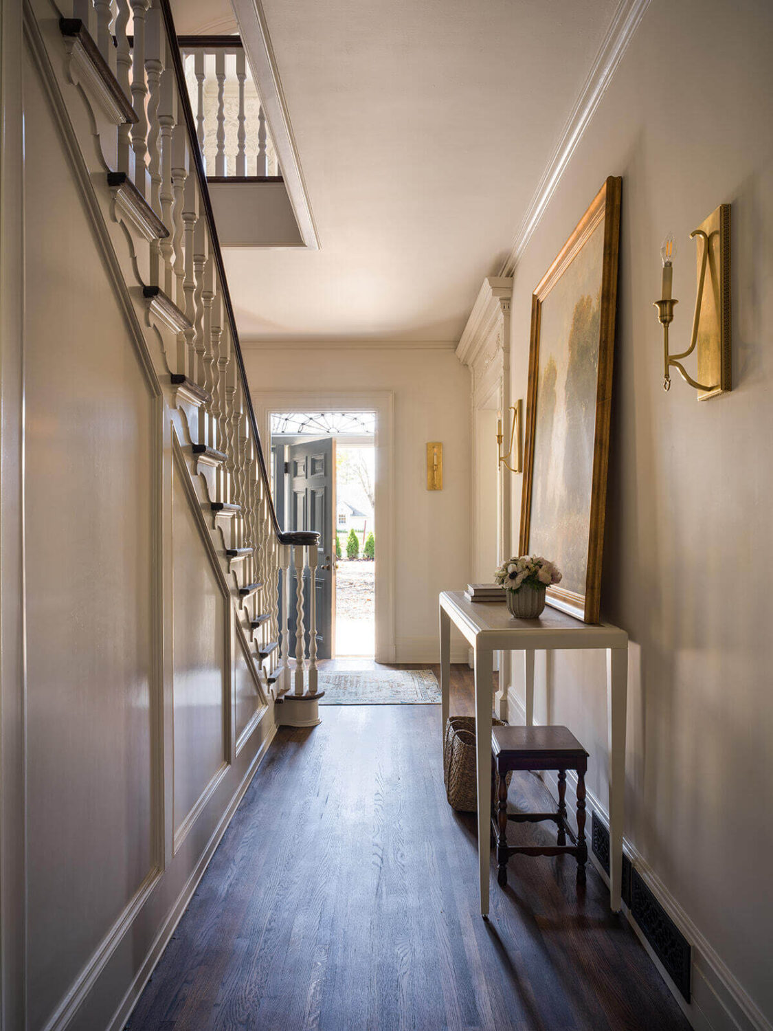 A Classic 1930s Home in Grand Rapids Designed by Jean Stoffer 23 foyer-hallway-stairs-sidetable-jean-stoffer-nordroom