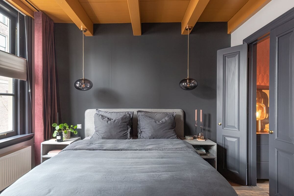 Gray and Earth Tones in a Restored Weavers House in The Netherlands 8 gray-bedroom-ochre-yellow-ceiling-pink-curtains-nordroom