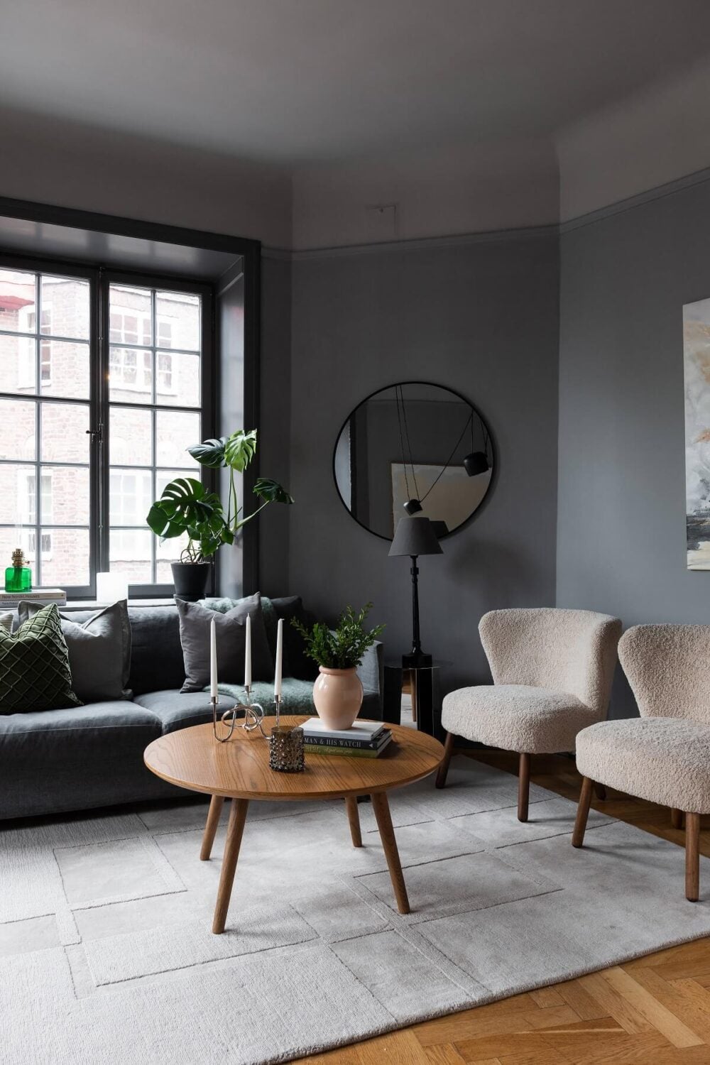 Behr Color of the Year 2024: Cracked Pepper 10 gray-living-room-large-ruf-wooden-floor-round-mirror-nordroom