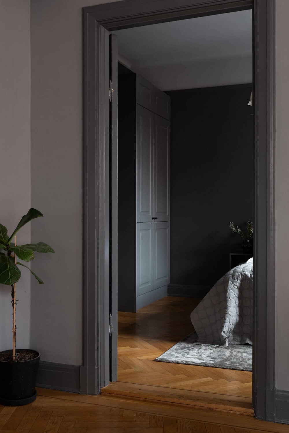 A Stylish Gray Apartment in Stockholm 12 gray-trimmings-wooden-floor-bedroom-nordroom