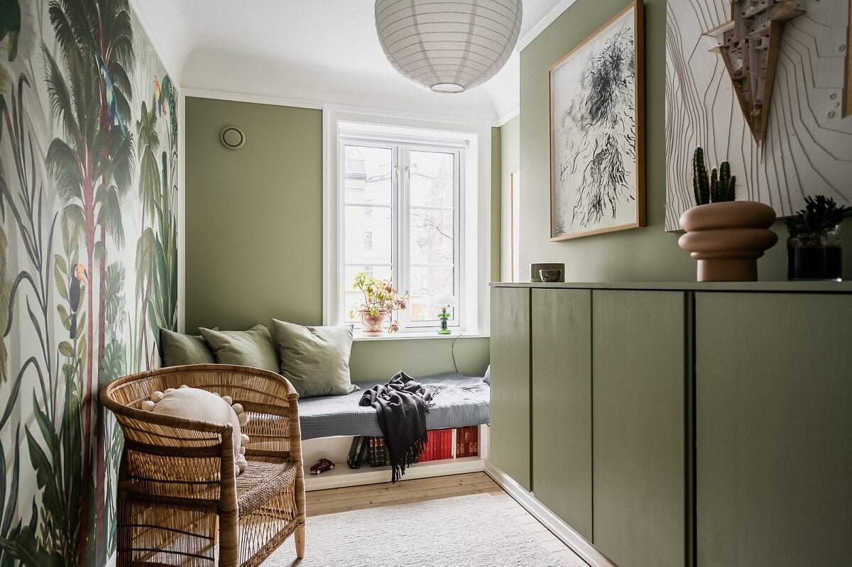 An Oslo Apartment with Custom Made Storage Solutions 15 green-kids-bedroom-ivar-cabinets-leaf-wallpaper-nordroom