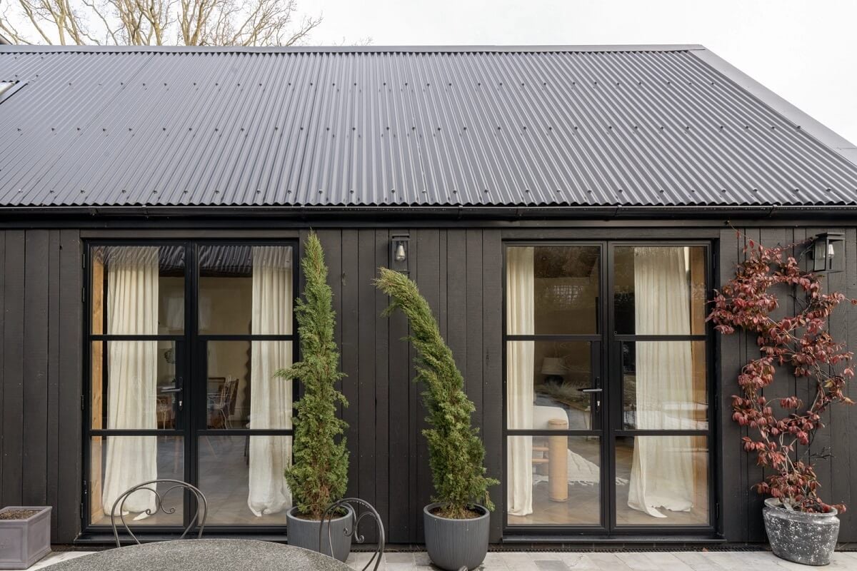A Victorian Home with a Modern Black Extension 27 guest-house-black-exterior-nordroom
