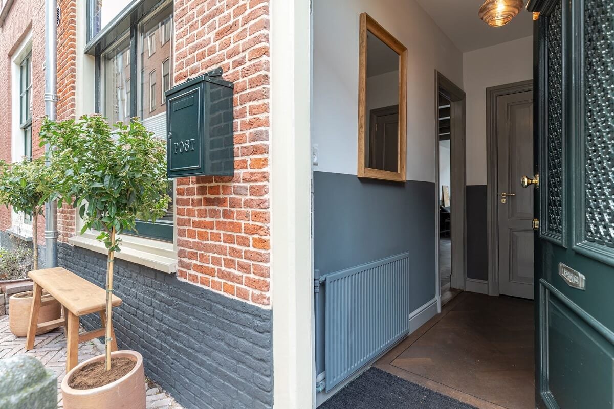 Gray and Earth Tones in a Restored Weavers House in The Netherlands 27 hallway-front-door-gray-walls-nordroom