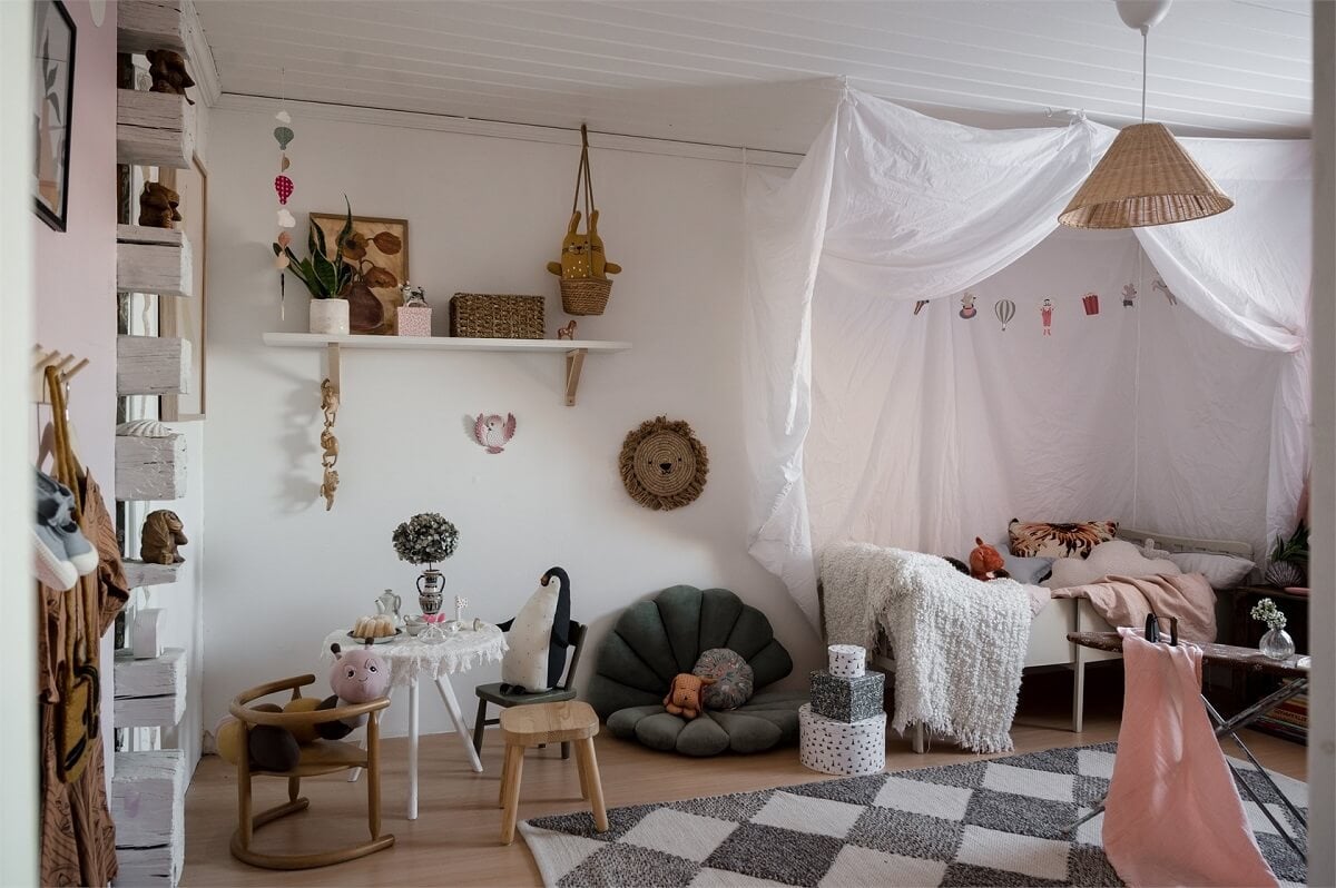A Charming Countryside Villa in Sweden 11 kids-bedroom-checkerboard-rug-canopy-bed-nordroom