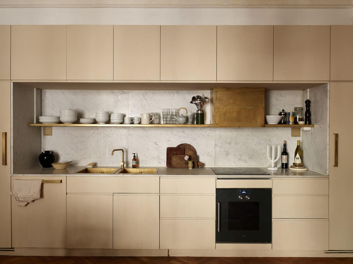 A Beige Vintage Apartment in Stockholm 10 kitchen-closed-upper-cabinets-shelf-beige-cupboards-nordroom