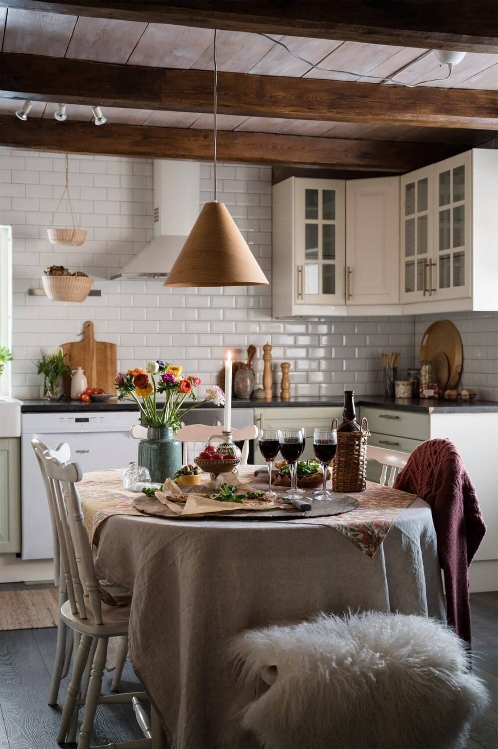 A Charming Countryside Villa in Sweden 2 kitchen-dining-room-exposed-wooden-beams-nordroom