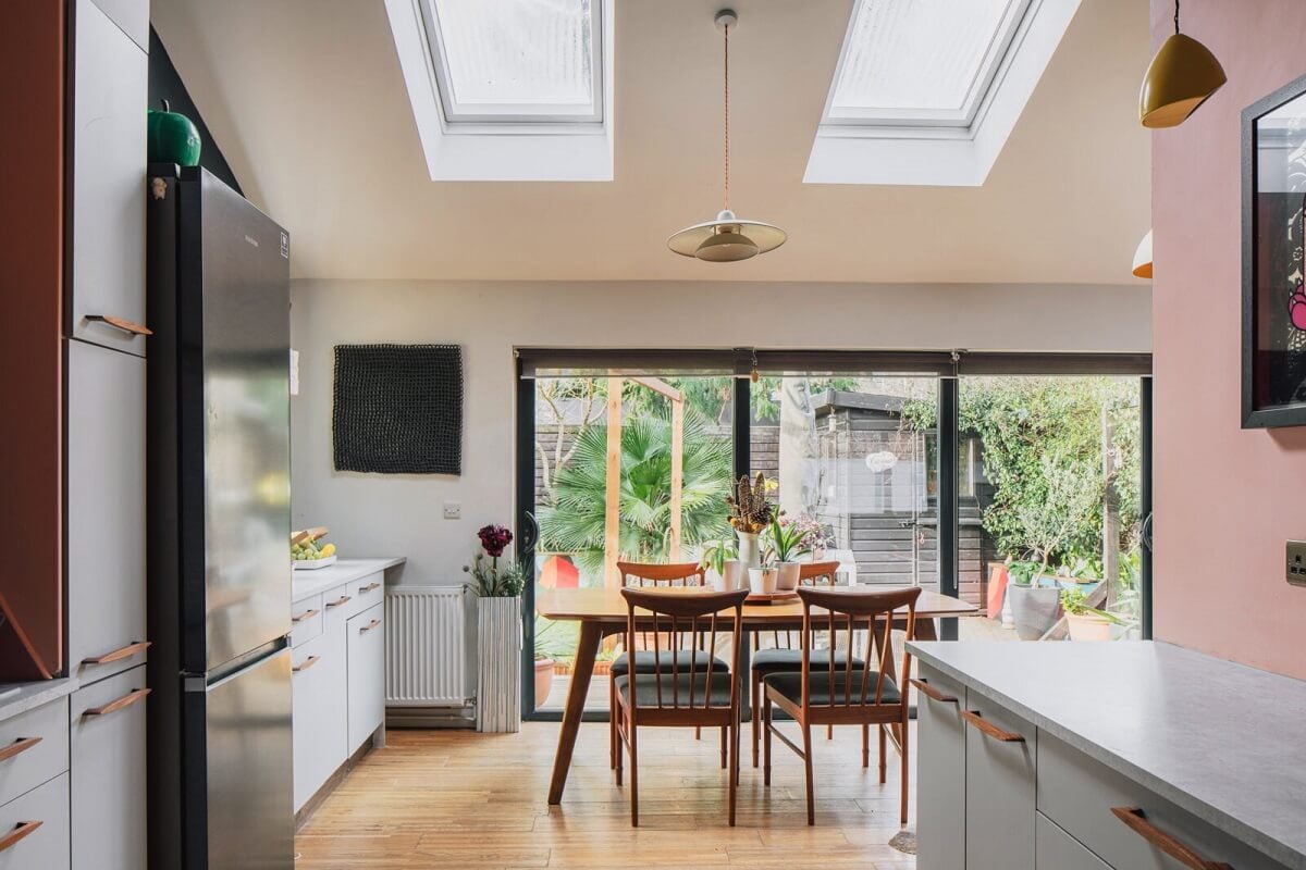 A London Home with Moody Rooms and a Pink Kitchen 7 kitchen-dining-room-skylights-nordroom