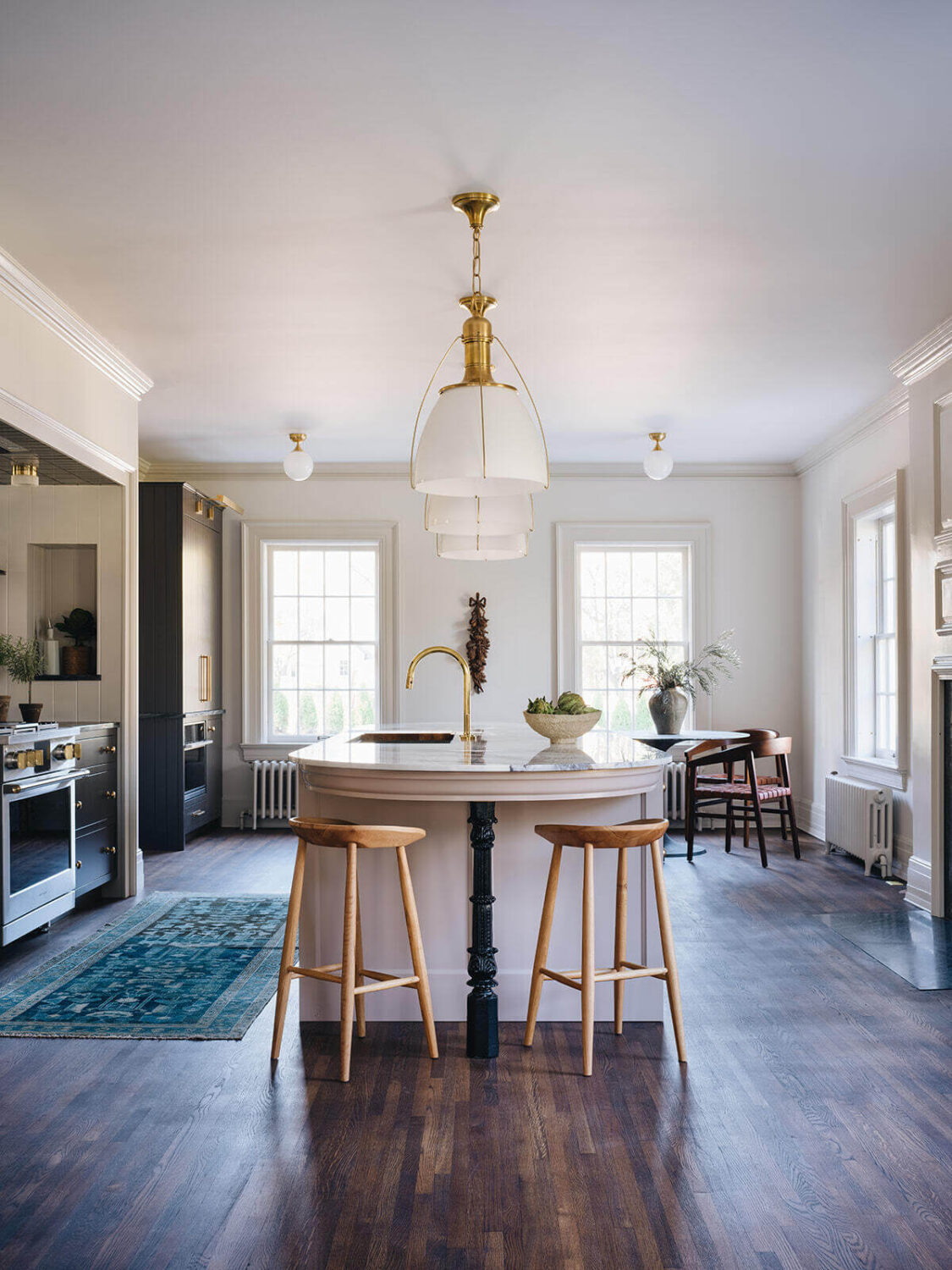A Classic 1930s Home in Grand Rapids Designed by Jean Stoffer 8 large-kitchen-round-island-stools-nordroom