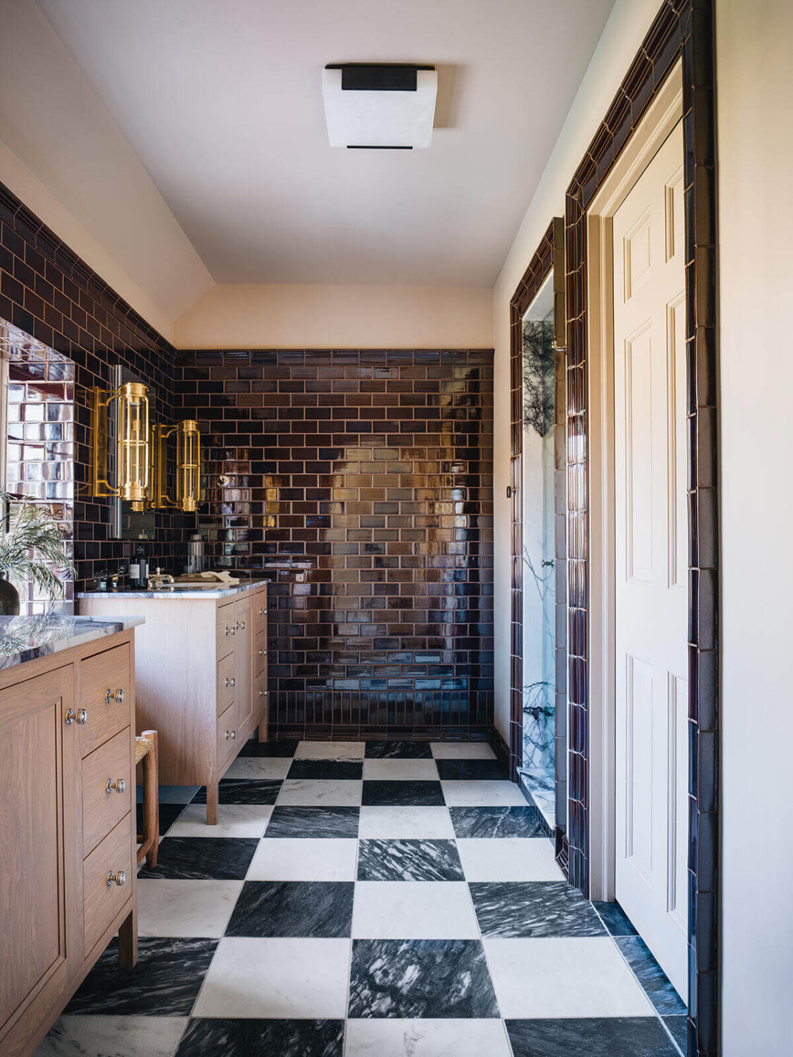 Best of 2023: Bathrooms 18 large-master-bathroom-black-white-checkerboard-floor-dark-blue-tiles-pink-vanity-nordroom