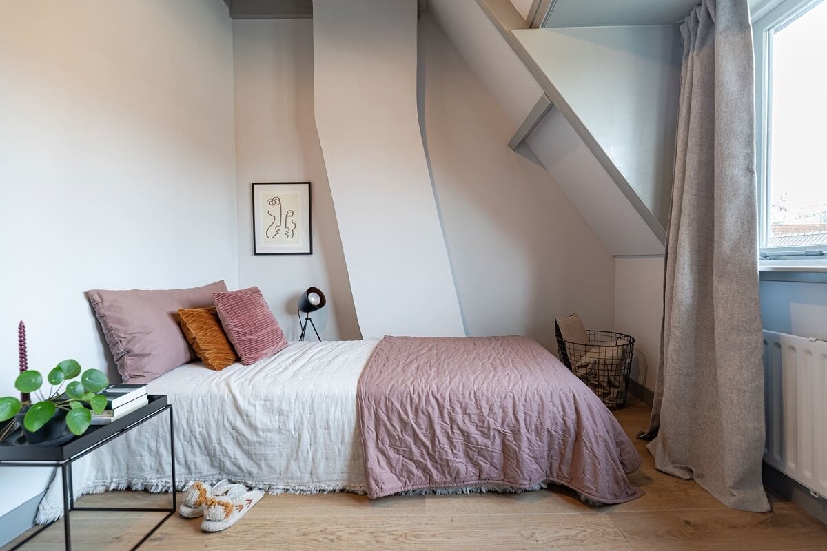 Gray and Earth Tones in a Restored Weavers House in The Netherlands 23 light-bedroom-slanted-ceiling-nordroom