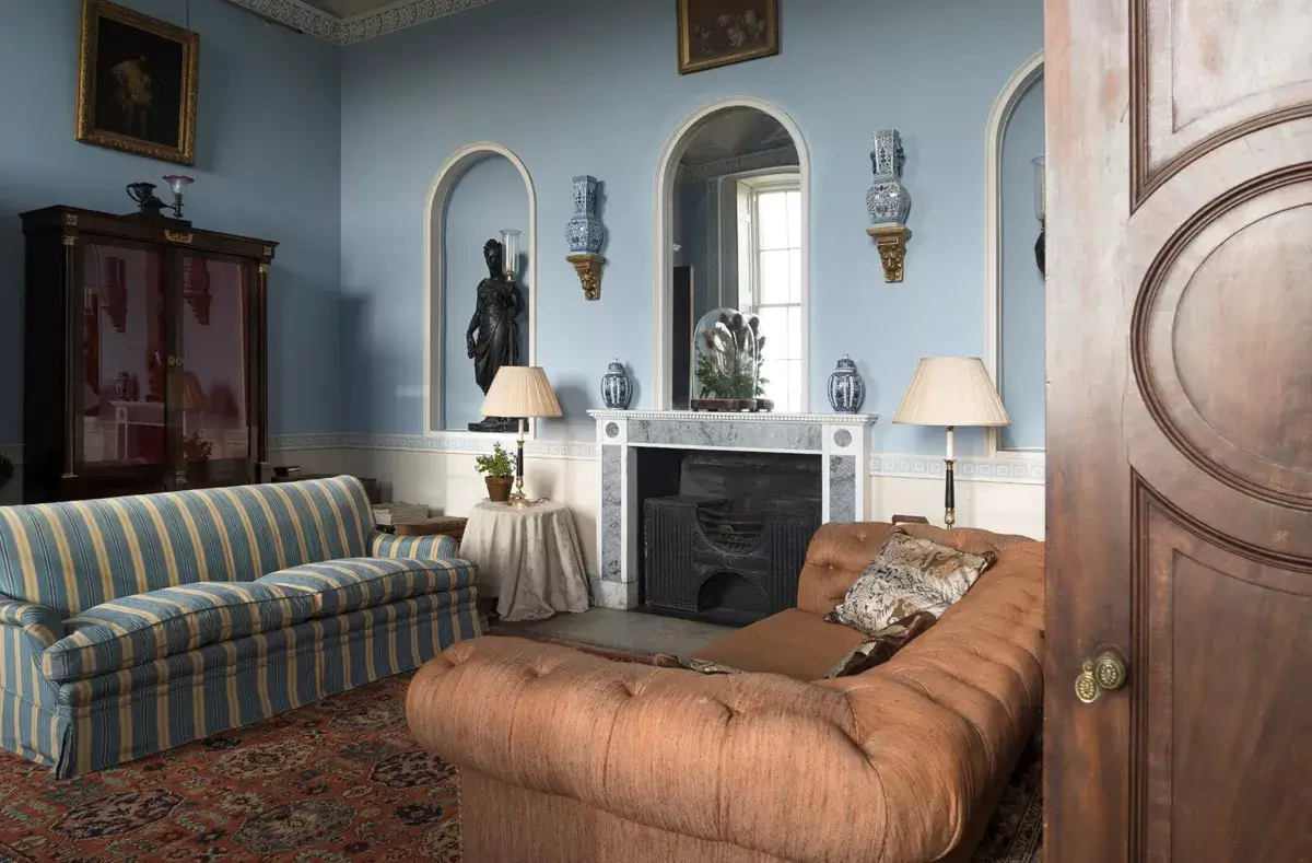 A Historic Greek Revival Country House in Scotland is For Sale 7 light-blue-sitting-room-fireplace-arches-country-house-scotland-nordroom