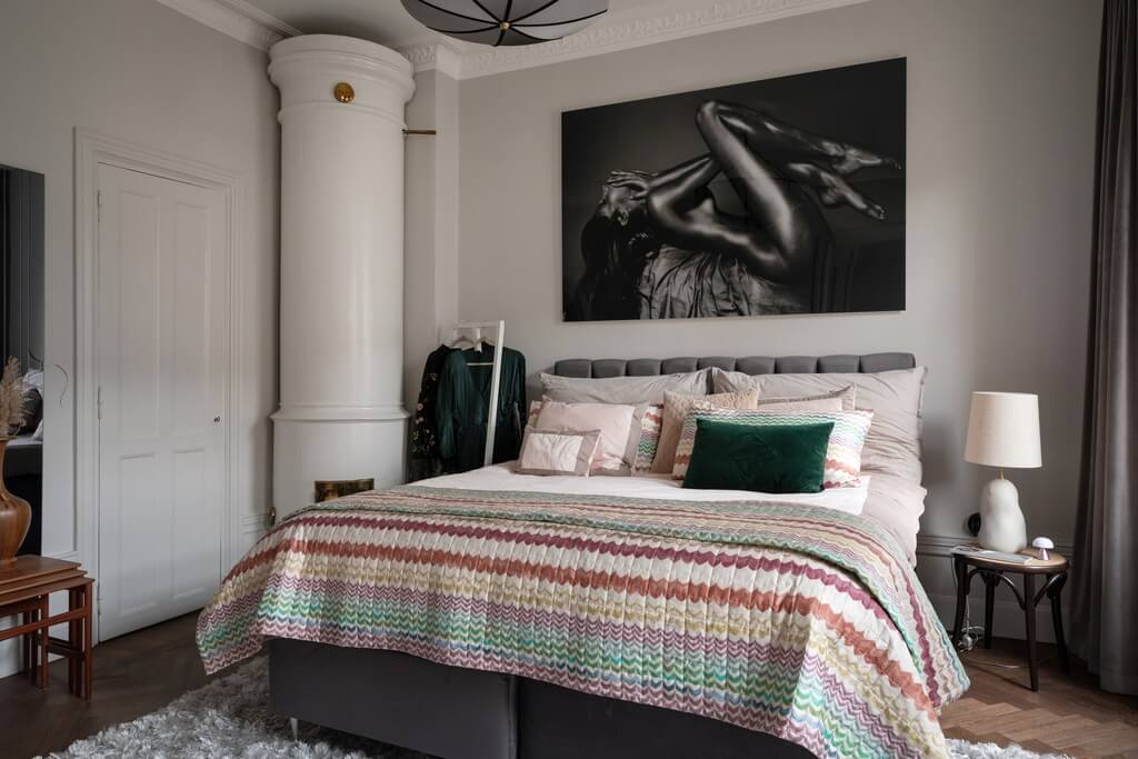 A Classic Swedish Apartment with Light Gray Walls 16 light-gray-walls-bedroom-fireplace-nordroom