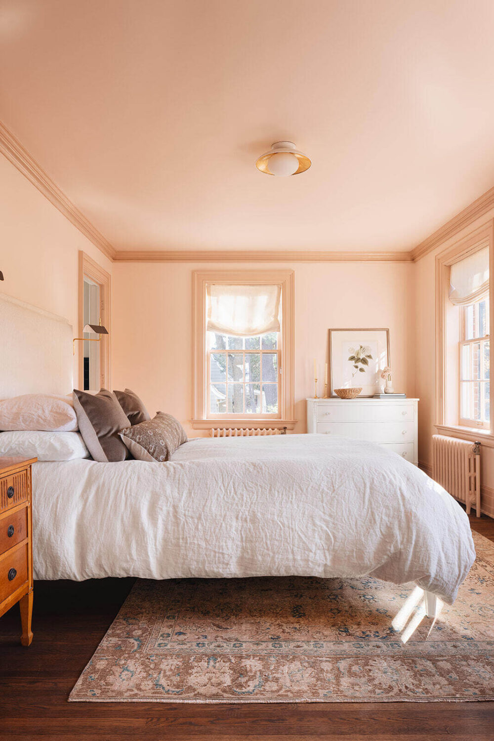 A Classic 1930s Home in Grand Rapids Designed by Jean Stoffer 32 light-pink-bedroom-rug-painted-ceiling-nordroom
