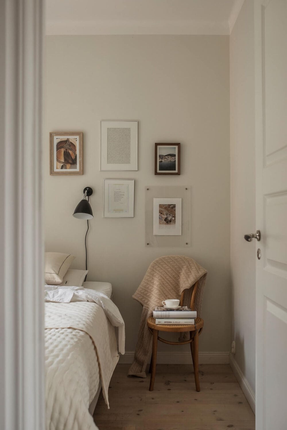 A Serene Light Colored Apartment in Stockholm 12 light-serene-bedroom-wooden-floor-nordroom