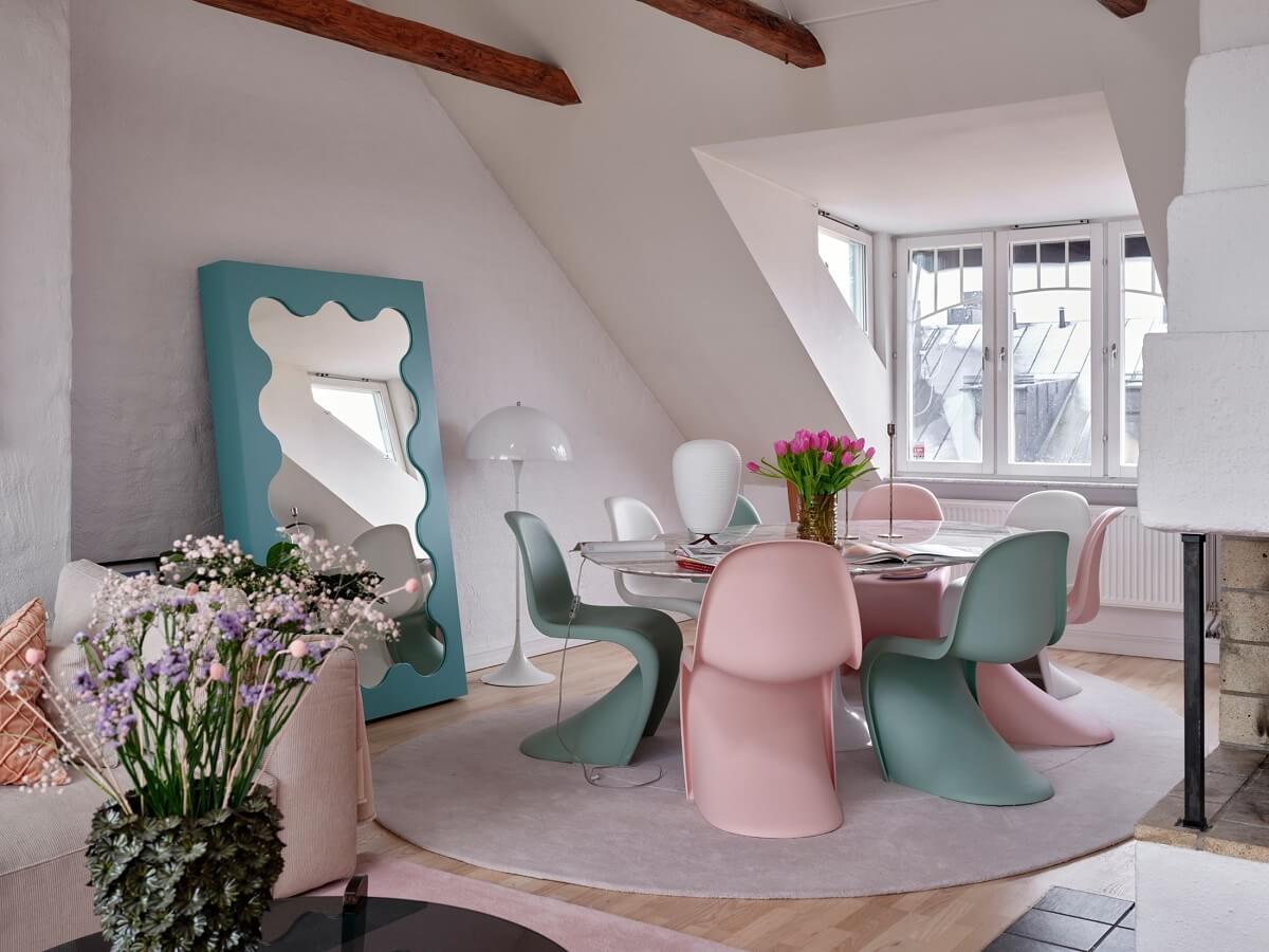 Pastel Color Accents in a Scandinavian Penthouse Apartment 6 living-dining-space-pastel-chairs-nordroom