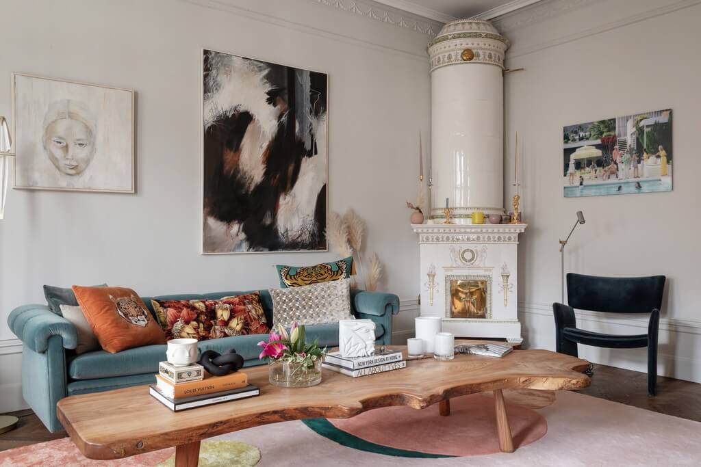 A Classic Swedish Apartment with Light Gray Walls 5 living-room-blue-sofa-fireplace-nordroom