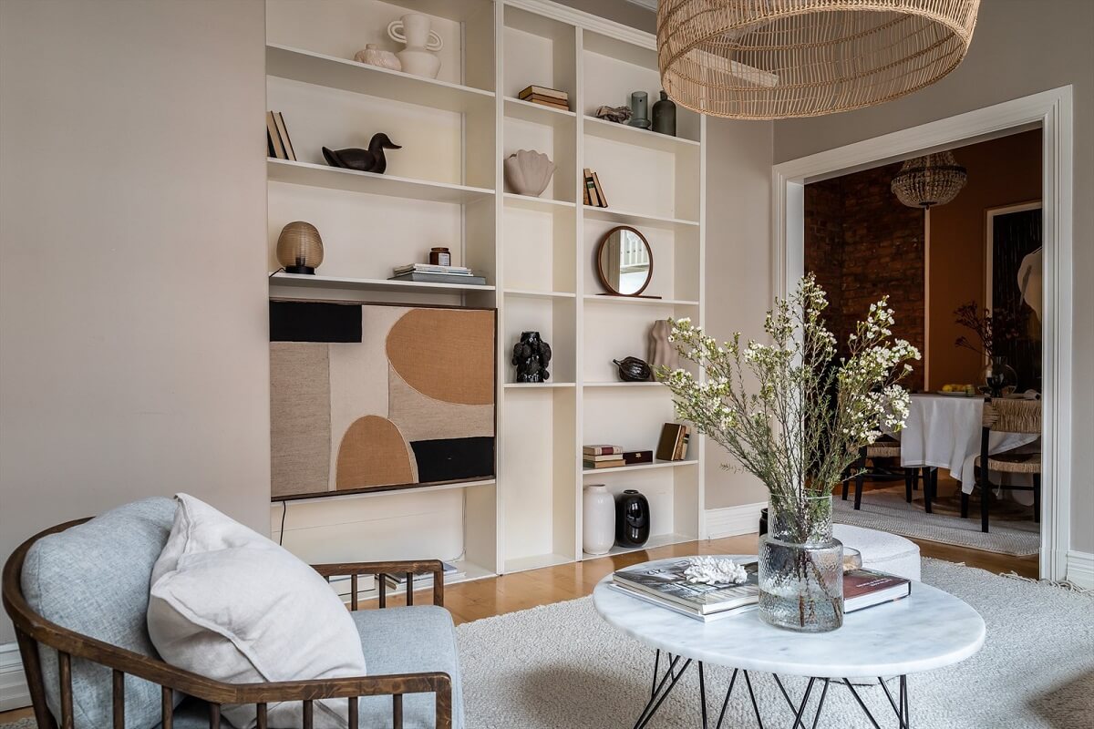 An Oslo Apartment Painted in Warm Color Tones 4 living-room-built-in-bookcase-television-nordroom