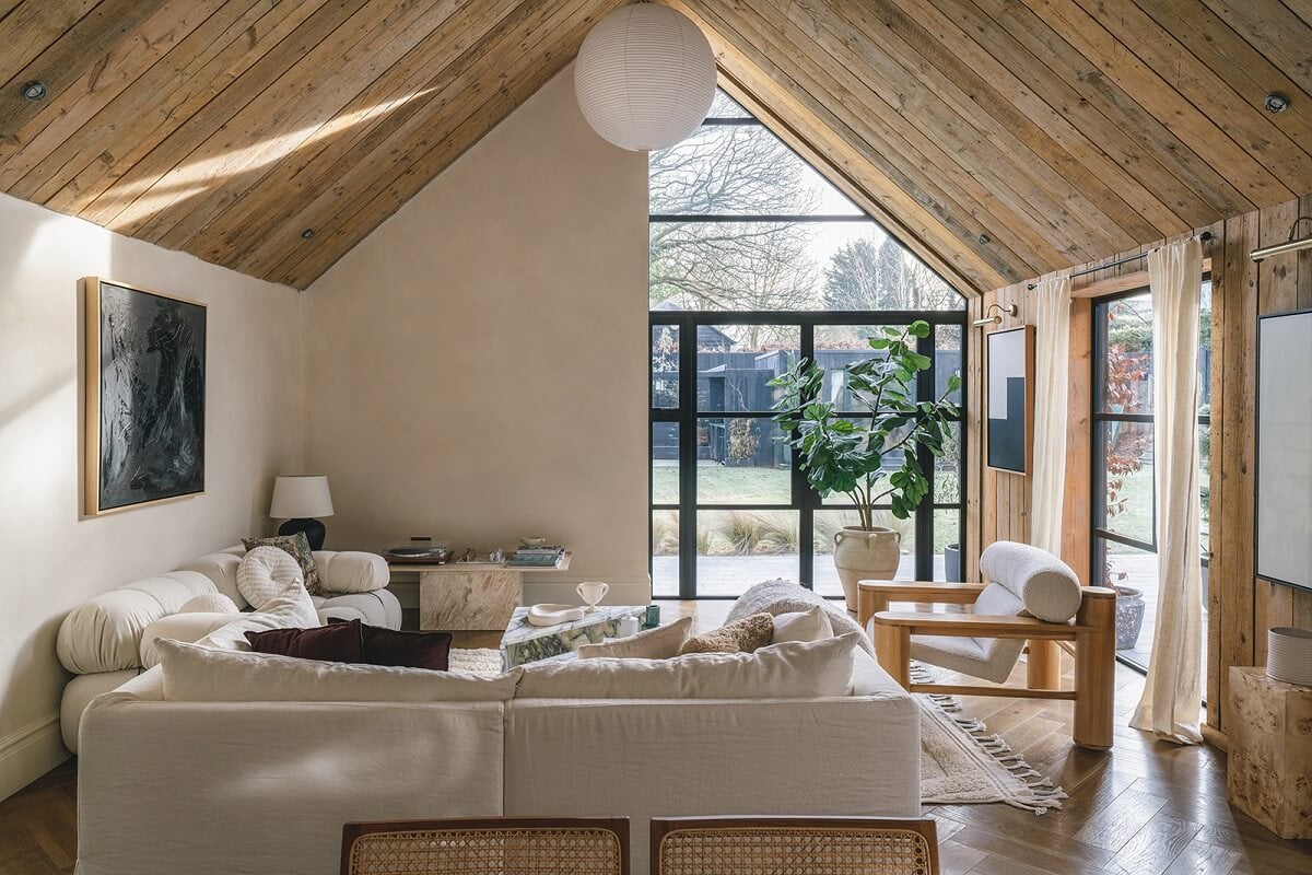A Victorian Home with a Modern Black Extension 1 living-room-white-sofa-wooden-pitched-ceiling-nordroom