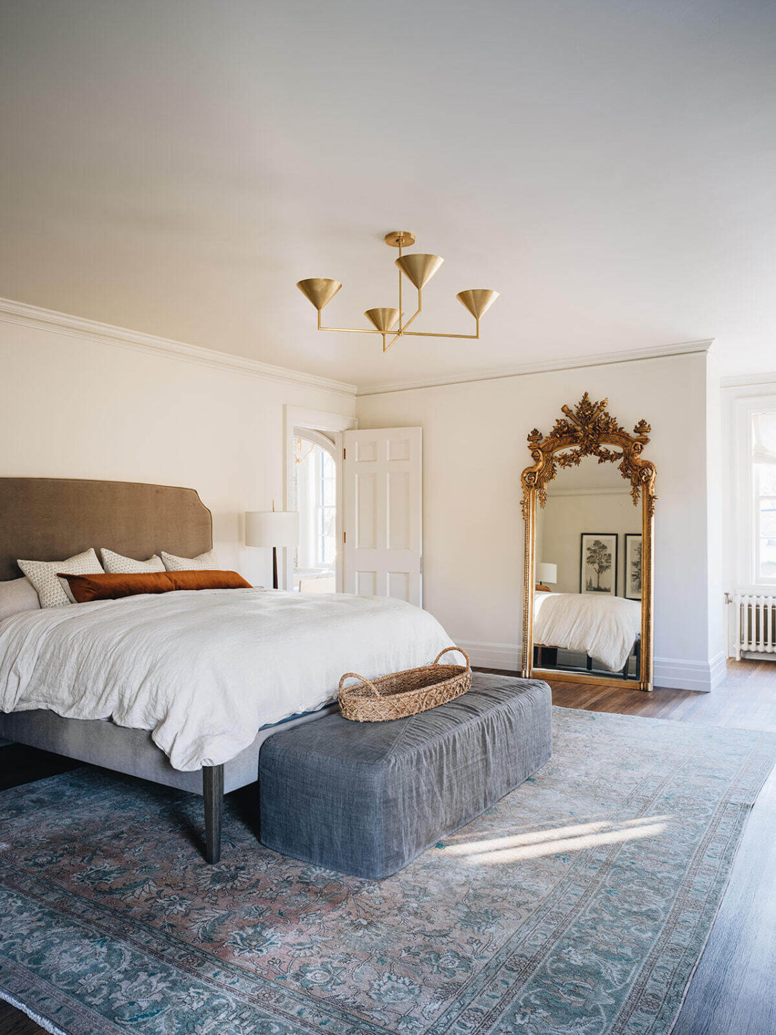 A Classic 1930s Home in Grand Rapids Designed by Jean Stoffer 28 master-bedroom-antique-mirror-large-area-rug-jean-stoffer-interior-design-nordroom