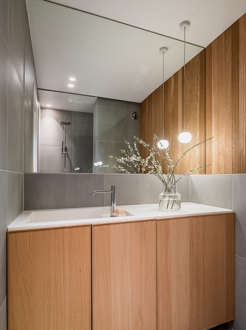 An Oslo Apartment with Custom Made Storage Solutions 16 minimalistic wood gray bathroom oslo apartment nordroom An Oslo Apartment with Custom Made Storage Solutions