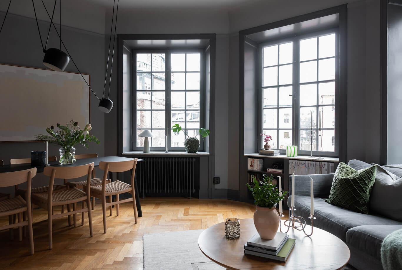 A Stylish Gray Apartment in Stockholm 8 open-plan-living-dining-room-gray-walls-nordroom