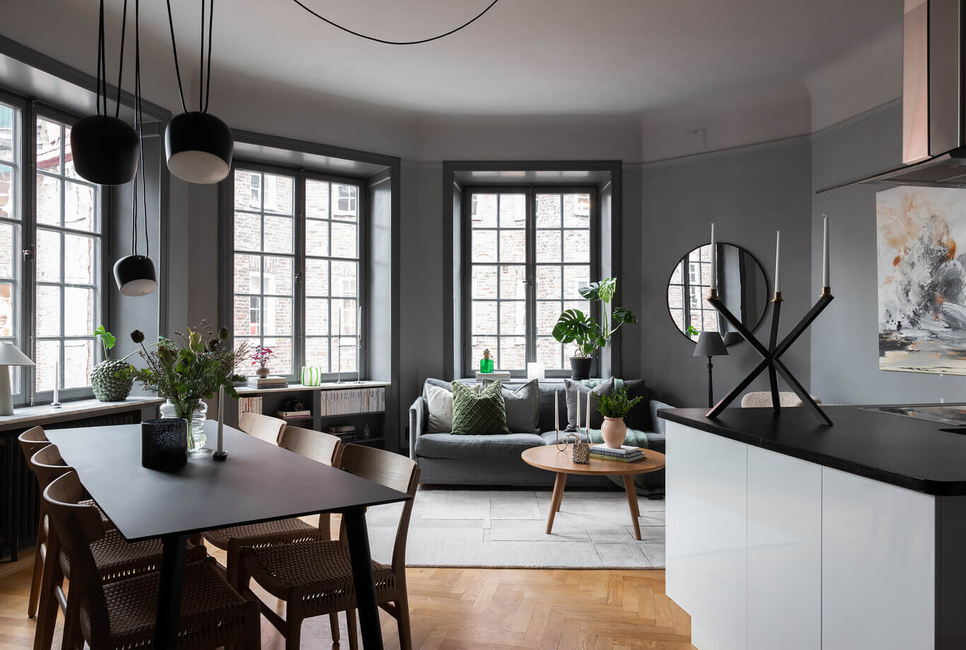 A Stylish Gray Apartment in Stockholm 9 open-plan-living-space-kitchen-gray-walls-nordroom