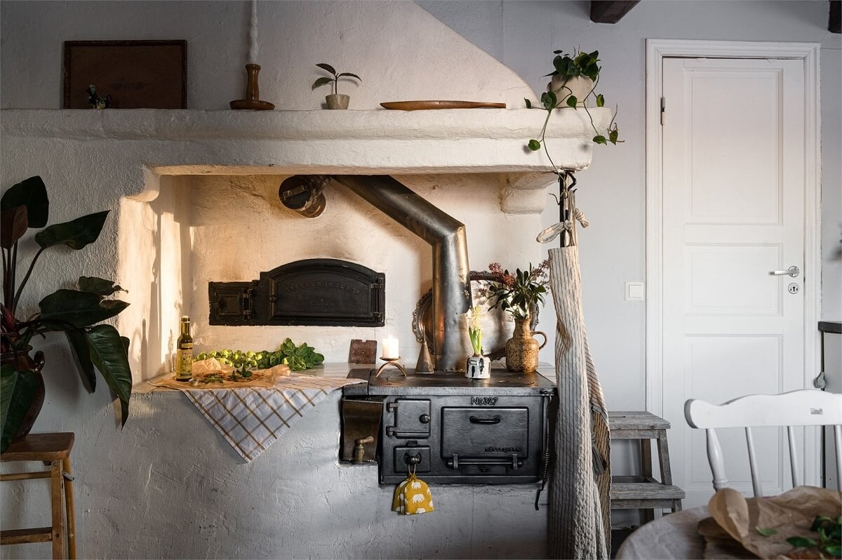 A Charming Countryside Villa in Sweden 6 original-stove-country-house-sweden-nordroom