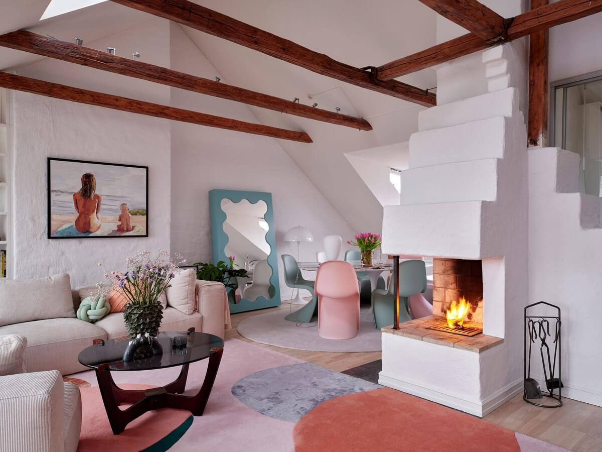 Pastel Color Accents in a Scandinavian Penthouse Apartment 1 penthouse-living-space-fireplace-exposed-beams-pastel-color-accents-nordroom