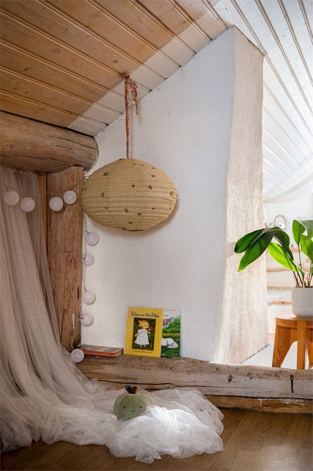A Charming Countryside Villa in Sweden 24 reading-nook-snug-slanted-ceiling-nordroom