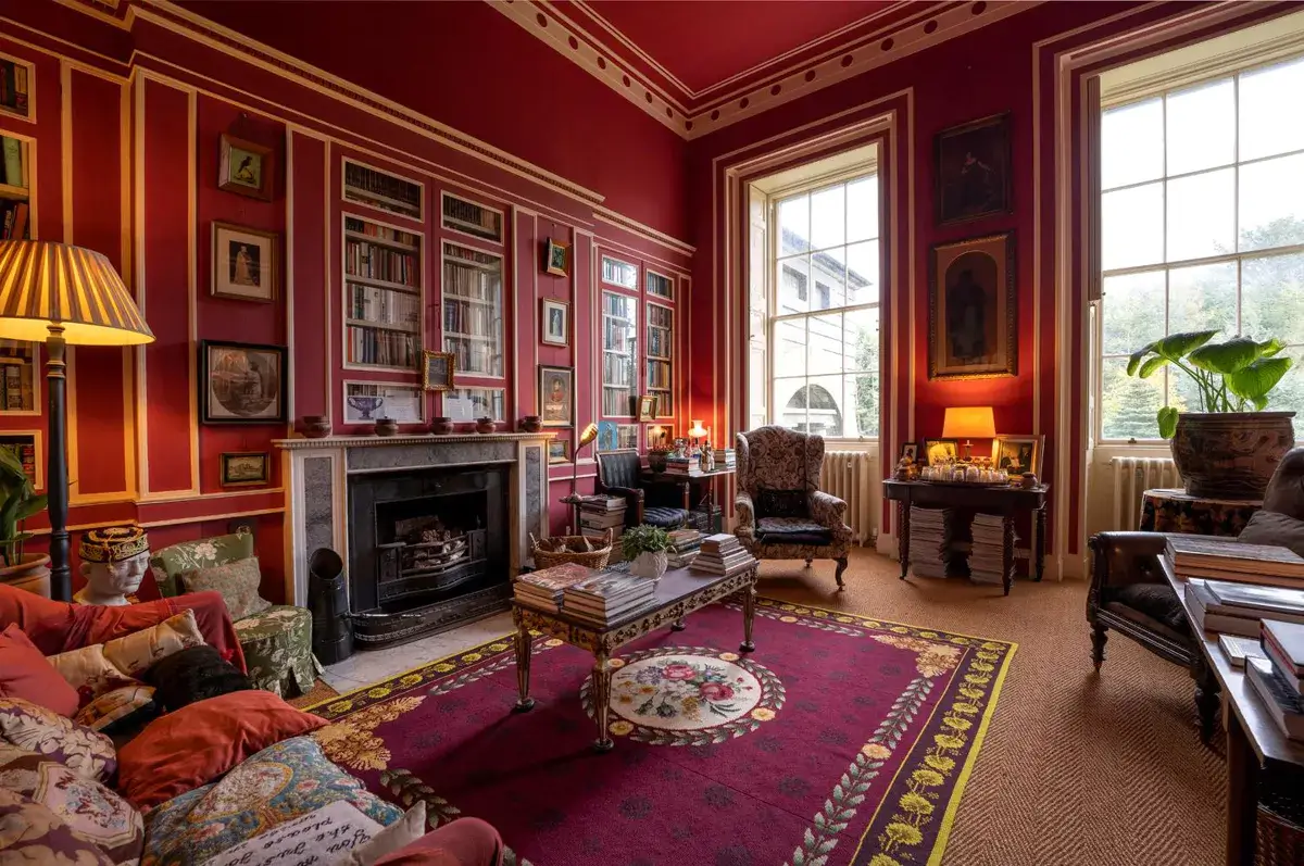 A Historic Greek Revival Country House in Scotland is For Sale 1 red-sitting-room-pink-rug-art-green-revivial-country-house-scotland-nordroom