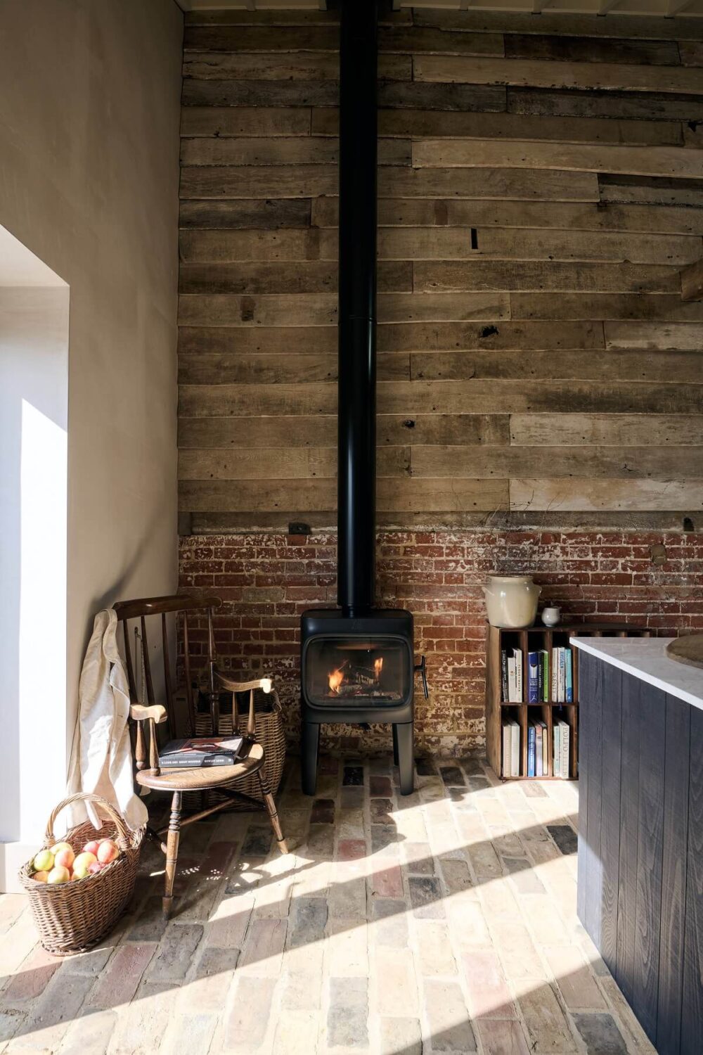 A deVOL Sebastian Cox Kitchen in a 17th Century Barn House 11 rocking-chair-wood-burner-The-Sebastian-Cox-Kitchen-deVOL-barn-house-nordroom