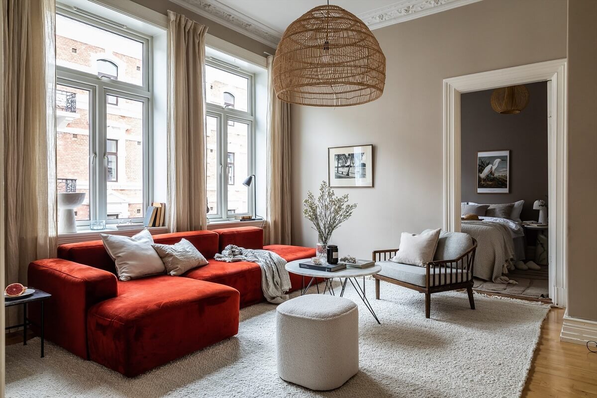 An Oslo Apartment Painted in Warm Color Tones 3 scandi-living-room-warm-neutrals-red-living-room-nordroom