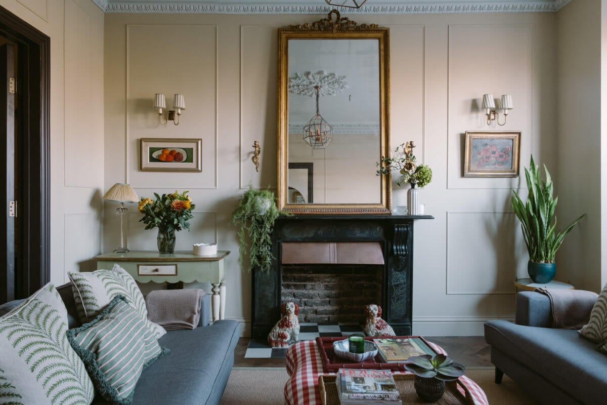 A Deep Red Kitchen in a Victorian Home in London 1 sitting-room-black-fireplace-antique-mirror-nordroom