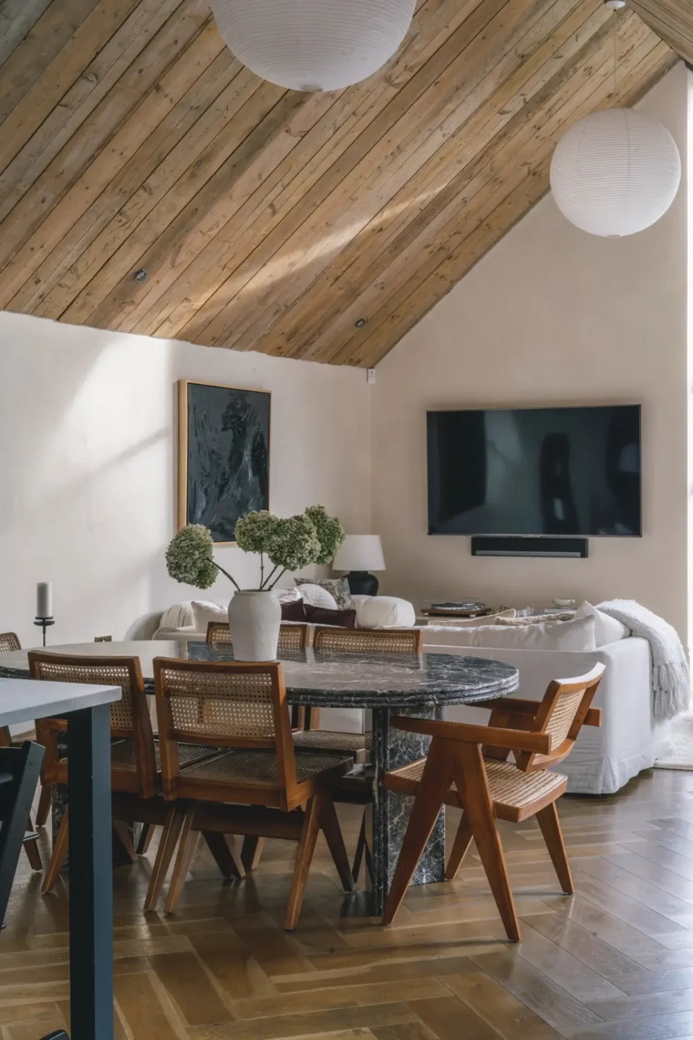 A Victorian Home with a Modern Black Extension 3 sitting-room-dining-table-wooden-ceiling-pitched-roof-nordroom