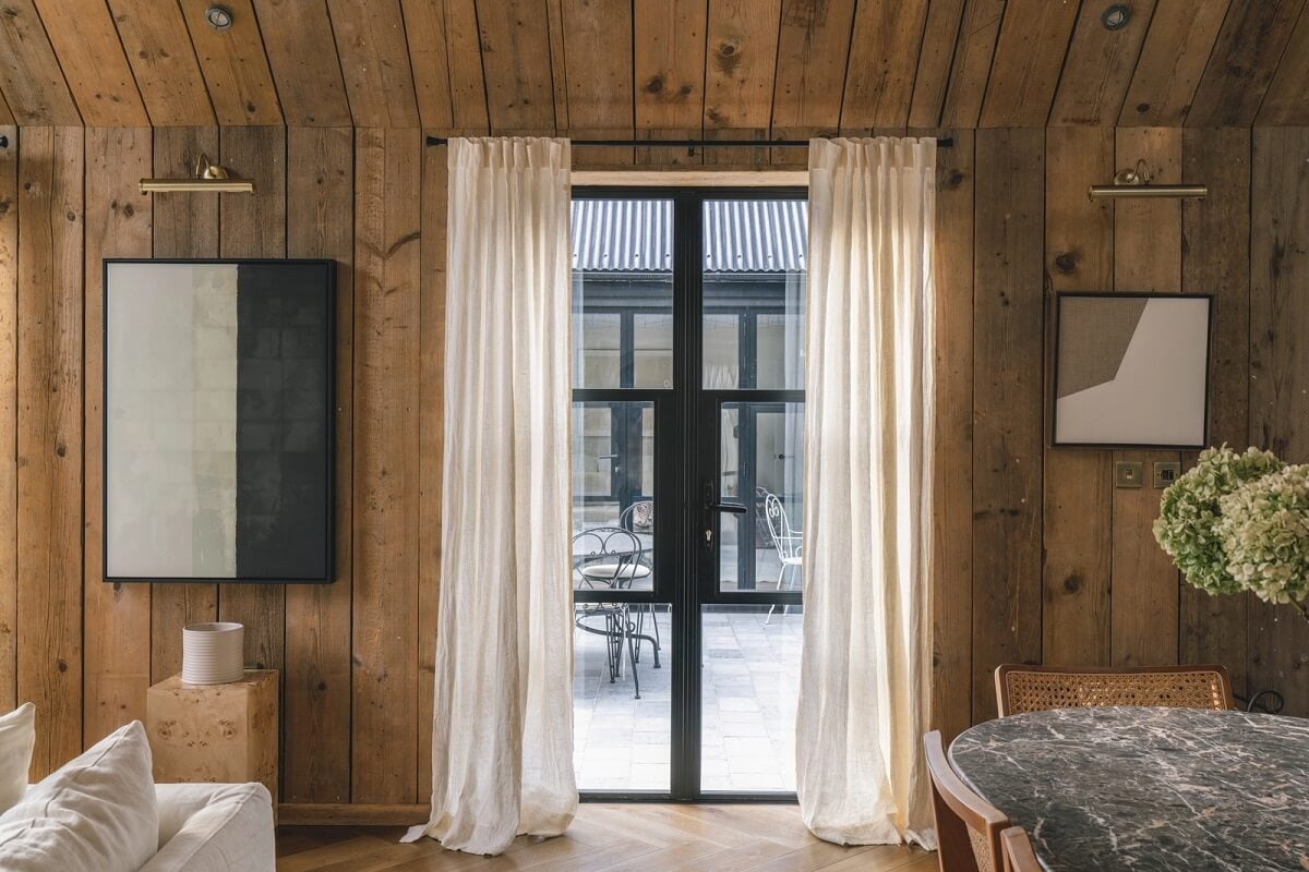 A Victorian Home with a Modern Black Extension 6 sitting-room-wood-plank-walls-ceiling-nordroom