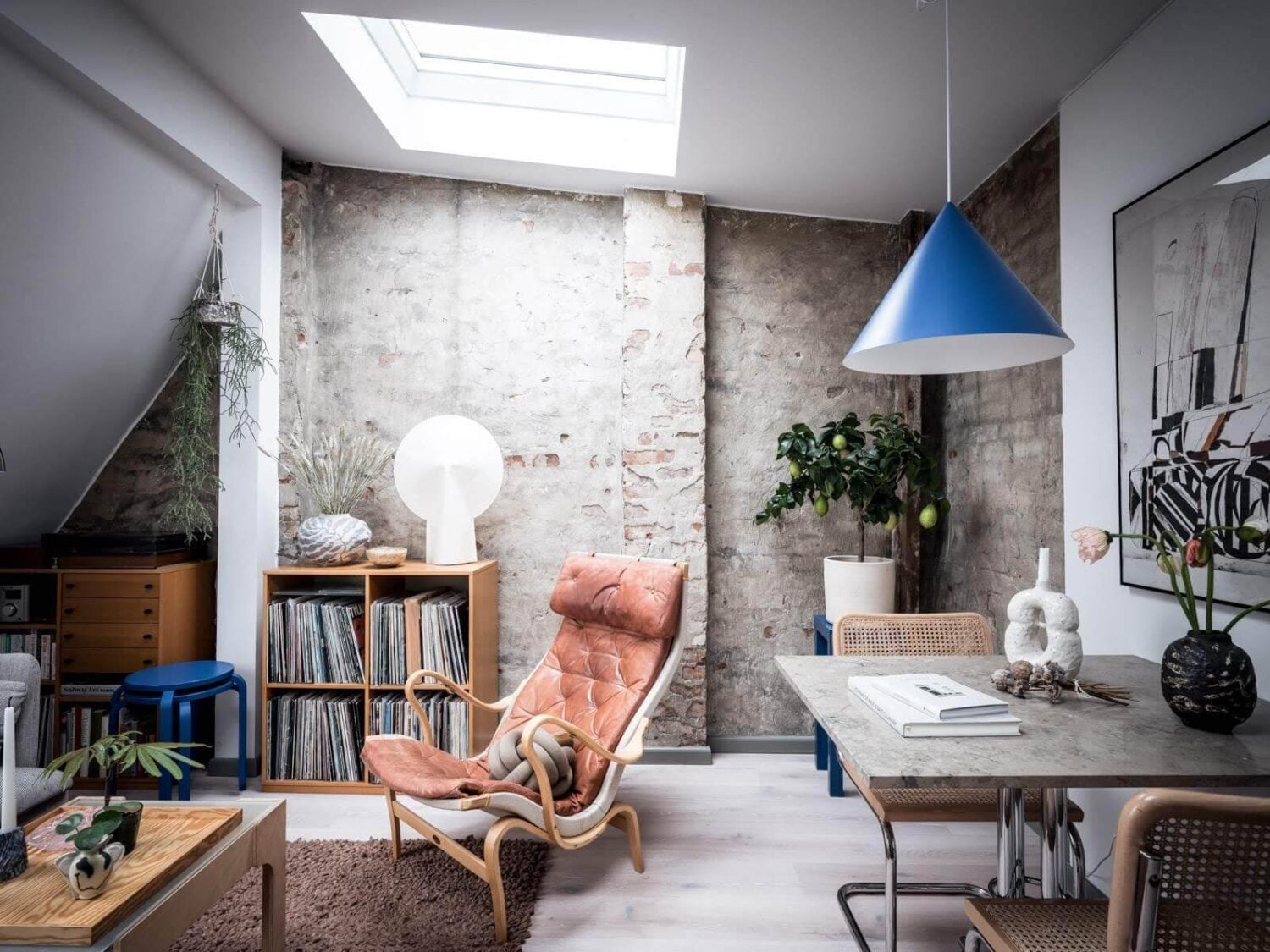 A Small Scandinavian Loft with Skylights and Brick Wall 5 skylights-small-nordic-loft-exposed-brick-sitting-room-nordroom