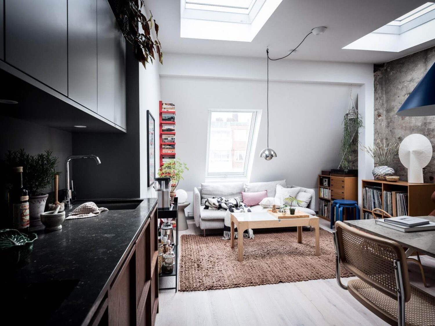 Best of 2023: Loft Apartments 8 small-attic-loft-skylight-exposed-brick-wall-nordroom