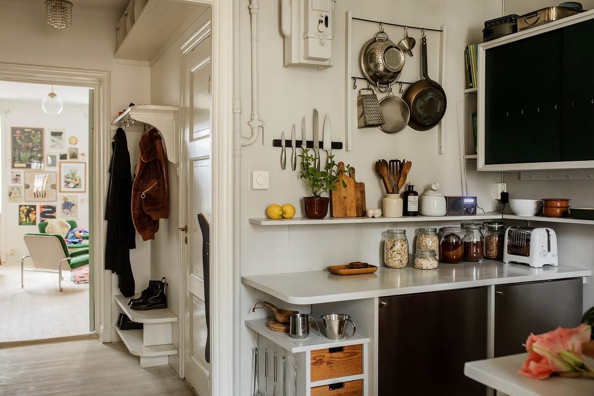 A Small Swedish Apartment Decorated in Midcentury Style 7 small-kitchen-open-closed-storage-nordroom