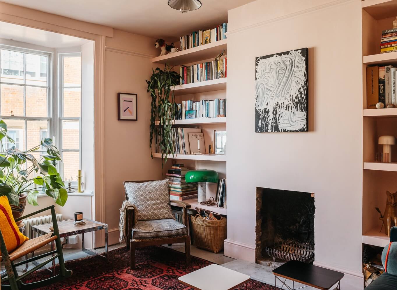 Colorful Rooms in a Historic English Home 1 small-living-room-pink-walls-fireplace-bookshelfs-nordroom