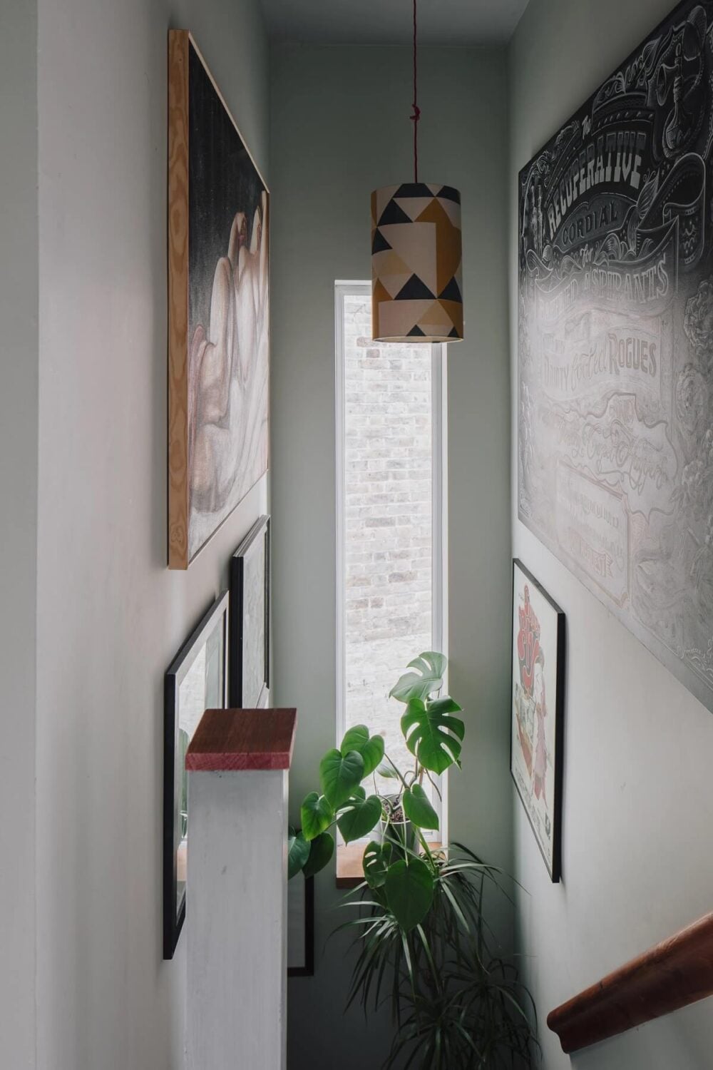 A London Home with Moody Rooms and a Pink Kitchen 11 staircase-narrow-window-nordroom