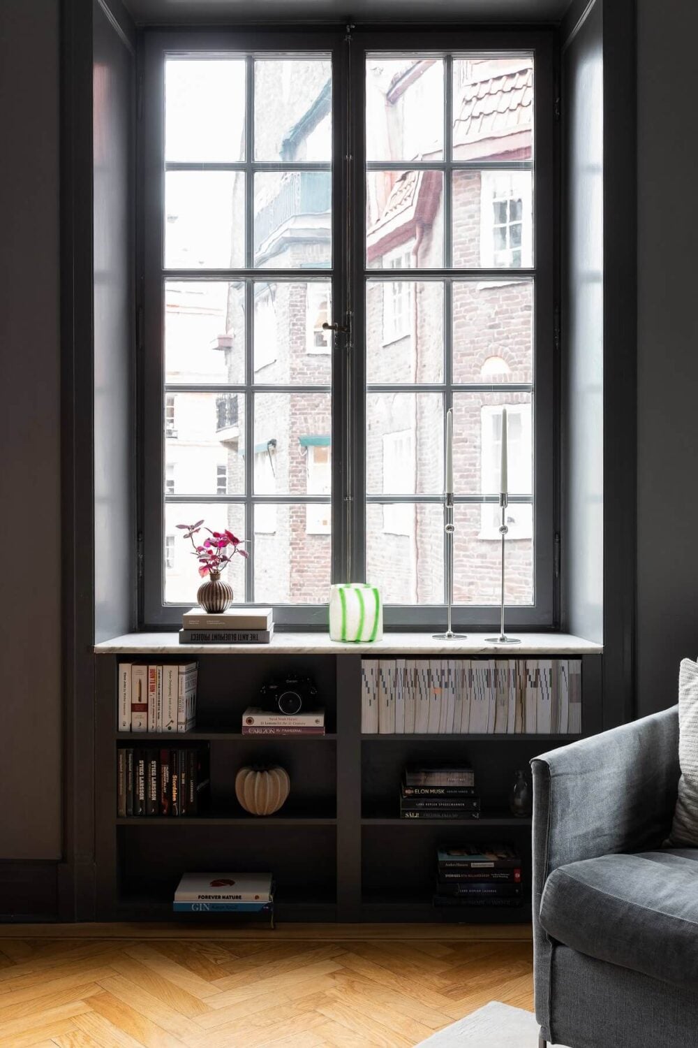 A Stylish Gray Apartment in Stockholm 4 storage-under-window-gray-scandinavian-home-nordroom