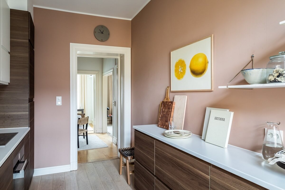 An Oslo Apartment Painted in Warm Color Tones 13 warm-kitchen-open-shelves-oslo-apartment-nordroom