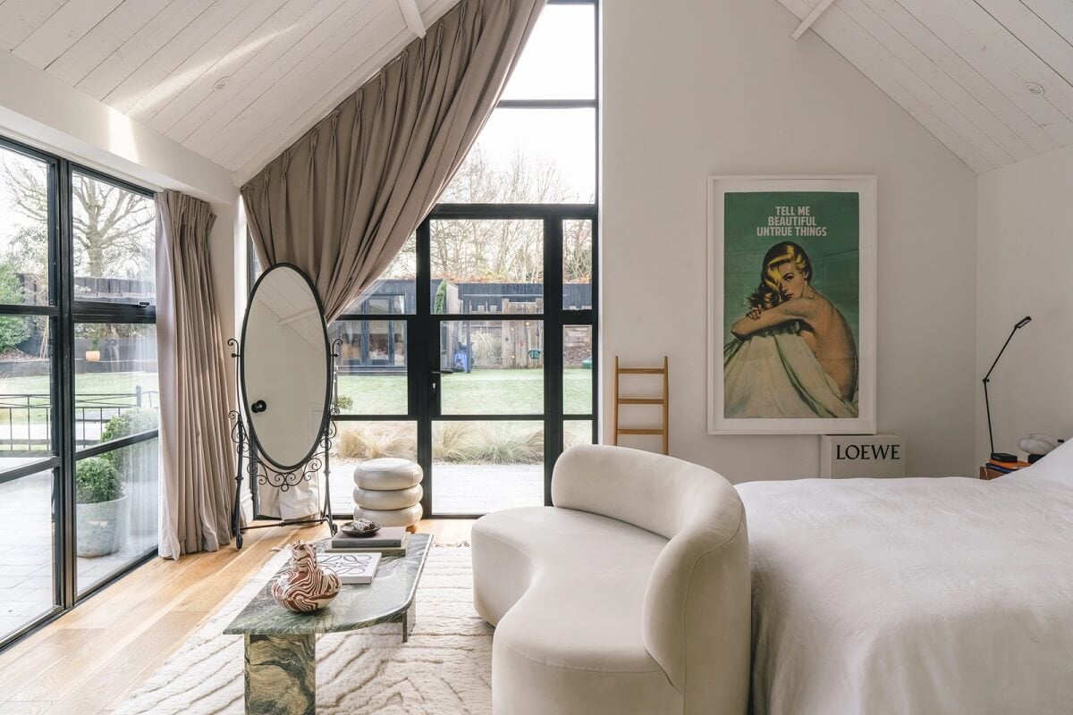 A Victorian Home with a Modern Black Extension 19 white-bedroom-sofa-pitched-roof-nordroom