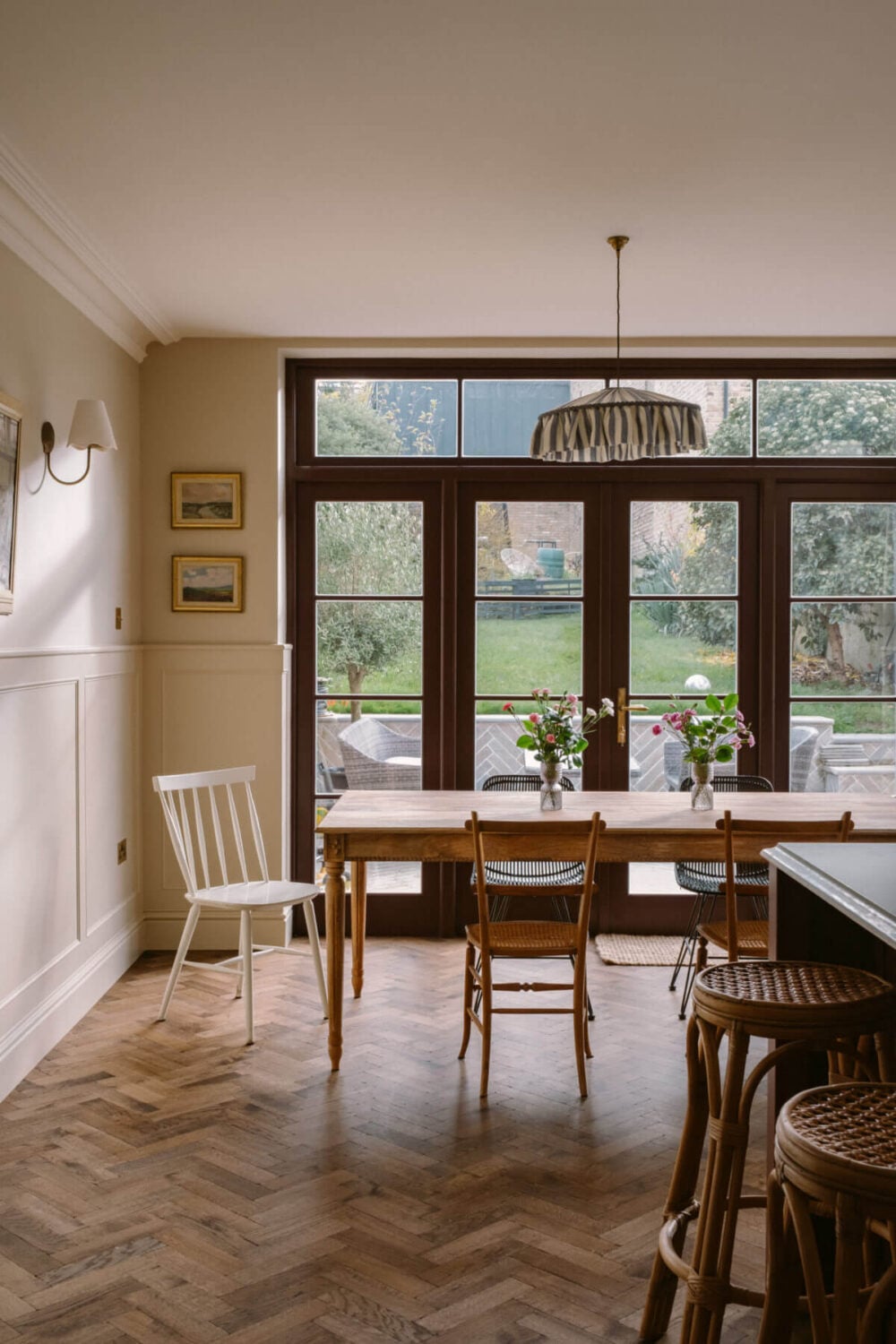 A Deep Red Kitchen in a Victorian Home in London 16 wooden-herringbone-floor-dining-space-country-style-kitchen-nordroom