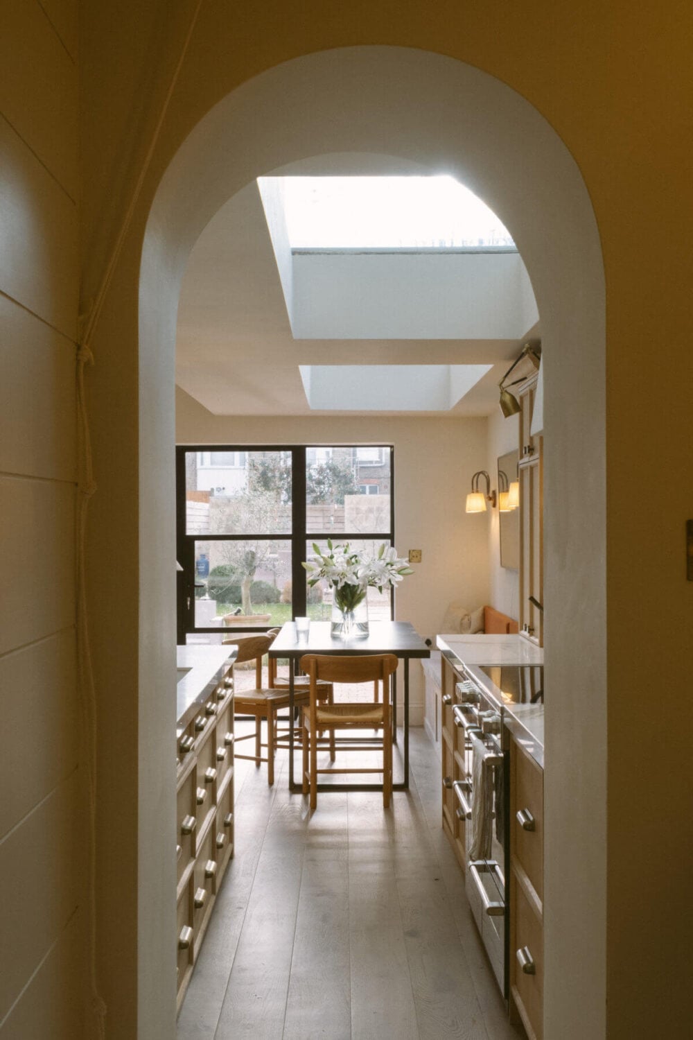 A Serene Renovated Victorian House in London 13 arched-doorway-kitchen-victorian-house-london-nordroom