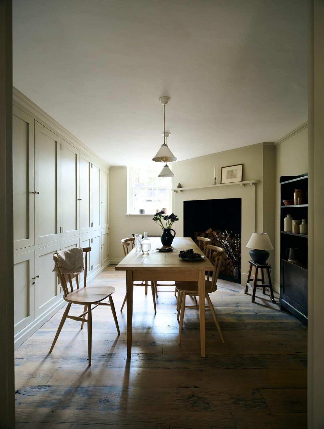 A Shaker-Style Basement Kitchen in a Georgian Townhouse 7 basement-kitchen-dining-table-wooden-floor-fireplace-nordroom