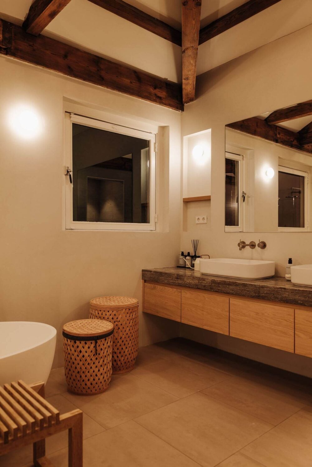 A Luxurious Canal Home in Amsterdam 17 bathroom-exposed-wooden-beams-double-sink-nordroom